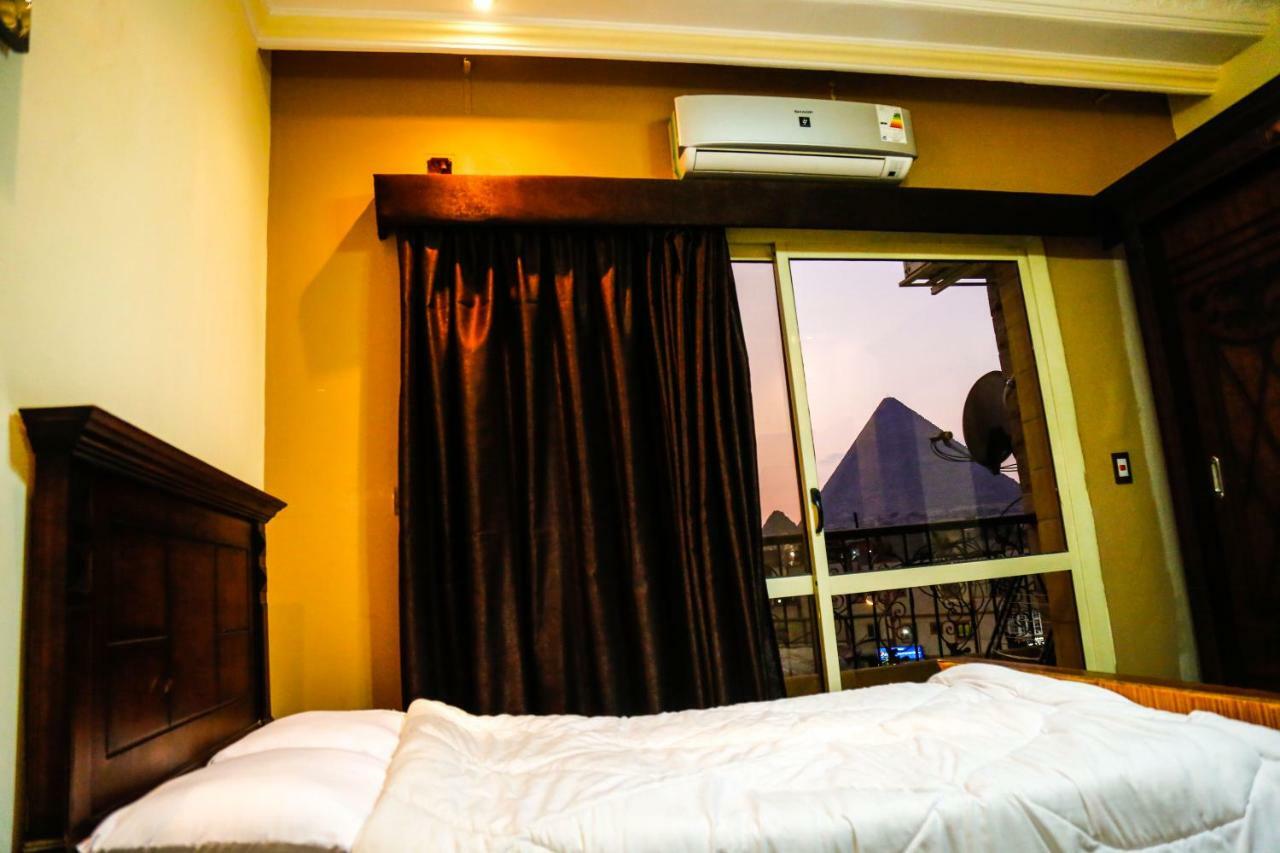 Happy days Pyramids Inn Kafret el-Gabal Exteriör bild