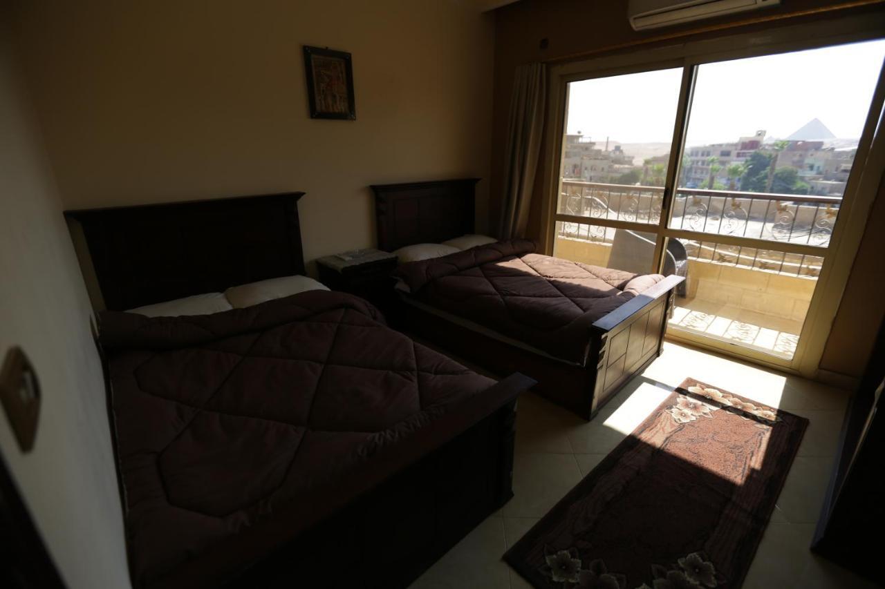 Happy days Pyramids Inn Kafret el-Gabal Exteriör bild