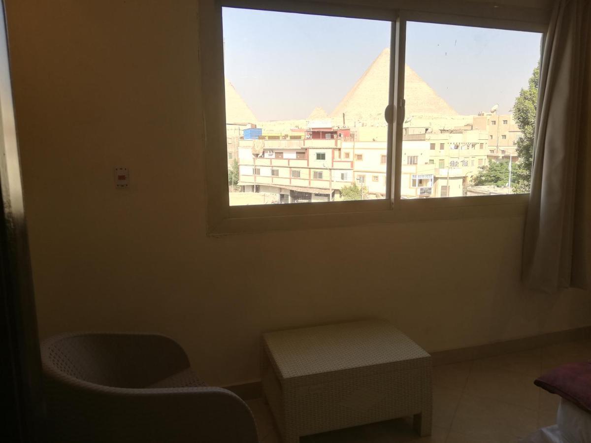 Happy days Pyramids Inn Kafret el-Gabal Exteriör bild